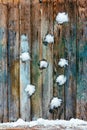 Snowballs pelted wooden retro grunge granary board background. Royalty Free Stock Photo