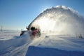 Snowblower cleaning road Royalty Free Stock Photo