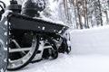 Snowblower at work on a winter day. Removing snow after blizzard snowfall. Clearing the ice. A snow blower is clearing a drivewayS