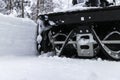 Snowblower at work on a winter day. Removing snow after blizzard snowfall. Clearing the ice. A snow blower is clearing a drivewayS