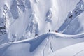 Snowboard freeride, snowboarders and tracks on a mountain slope. Extreme sport.