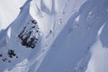 Snowboard freeride, snowboarders and tracks on a mountain slope. Extreme sport.