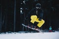 Snowboard Freestyle Jump. Snowboarder Jumping Through Air