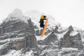 Snowboard ski freestyle big air contest in the background Mittelhorn mountain. Snowboard tricks, ski tricks. Jungfrau region