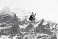 Snowboard ski freestyle big air contest in the background Mittelhorn mountain. Snowboard tricks, ski tricks. Jungfrau region