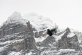 Snowboard ski freestyle big air contest in the background Mittelhorn mountain. Snowboard tricks, ski tricks. Jungfrau region