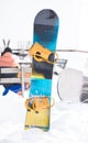 Snowboard stuck in snow in front of cafe Royalty Free Stock Photo