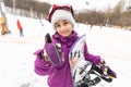 Snowboard winter sport. Cute girl with snowboard going to slide in winter nature Royalty Free Stock Photo