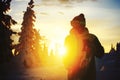 Snowboarder in backlight sunset. Ski resort Sheregesh