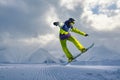 Snowboarder does the jumping trick. snow scatters pieces