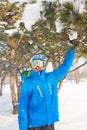 A snowboarder enjoying life, playing with snow, resting at a ski Royalty Free Stock Photo