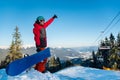 Snowboarder exploring snowy mountains Royalty Free Stock Photo