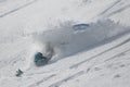 Snowboarder falling