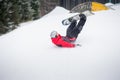 Snowboarder falls on the slopes during the jumping Royalty Free Stock Photo