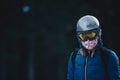 Snowboarder fashion portrait in frozen forest