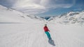 MÃ¶lltaler Gletscher - A snowboarder going down the slope