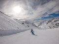 MÃ¶lltaler Gletscher - A snowboarder going down the slope Royalty Free Stock Photo