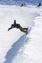 Snowboarder on half pipe of Pradollano ski resort in Spain