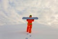 Snowboarder climbing on the top of ski slope Royalty Free Stock Photo