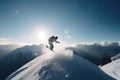 Snowboarder in a jump on a high mountain, Freerider running downhill