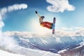 Snowboarder at jump in high mountains at sunny day. Neural network AI generated