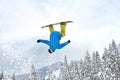 Snowboarder at jump inhigh mountains Royalty Free Stock Photo