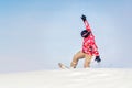 Snowboarder at jump inhigh mountains at sunny day. Copy space Royalty Free Stock Photo