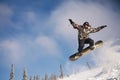 Snowboarder jumping Royalty Free Stock Photo