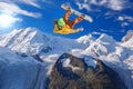 Snowboarder jumping against Matterhorn peak in Switzerland Royalty Free Stock Photo