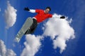 Snowboarder jumping against sky Royalty Free Stock Photo