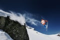 Snowboarder jumping from a cliff Royalty Free Stock Photo