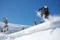 Snowboarder in action on a sunny winter day. Royalty Free Stock Photo