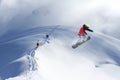 Snowboarder jumping on mountains. Extreme sport. Royalty Free Stock Photo