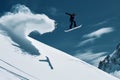 snowboarder jumping on a snowcovered mountain