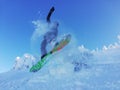 Snowboarder jumps on a powder hill