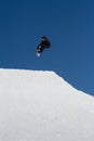 Snowboarder jumps in Snow Park, ski resort