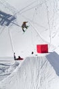 Snowboarder jumps in Snow Park, ski resort