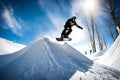 A snowboarder launching Royalty Free Stock Photo