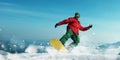 Snowboarder makes a jump, sportsman in action Royalty Free Stock Photo