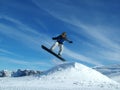Snowboarder in the mountains Royalty Free Stock Photo