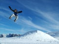 Snowboarder in the mountains Royalty Free Stock Photo