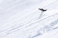 Snowboarder on mountainside