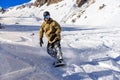 Snowboarder moving down Royalty Free Stock Photo