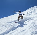 Snowboarder moving down Royalty Free Stock Photo