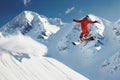snowboarder performing jump against snowcapped peaks Royalty Free Stock Photo