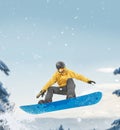 Snowboarder performing a jump Royalty Free Stock Photo