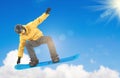 Snowboarder performing a tail grab Royalty Free Stock Photo