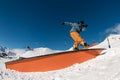 Snowboarder Precision. Tricks and balance on the wallride. Royalty Free Stock Photo