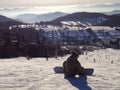 Snowboarder preparing on slope