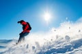 Snowboarder Riding Red Snowboard in Mountains at Sunny Day. Snowboarding and Winter Sports Royalty Free Stock Photo